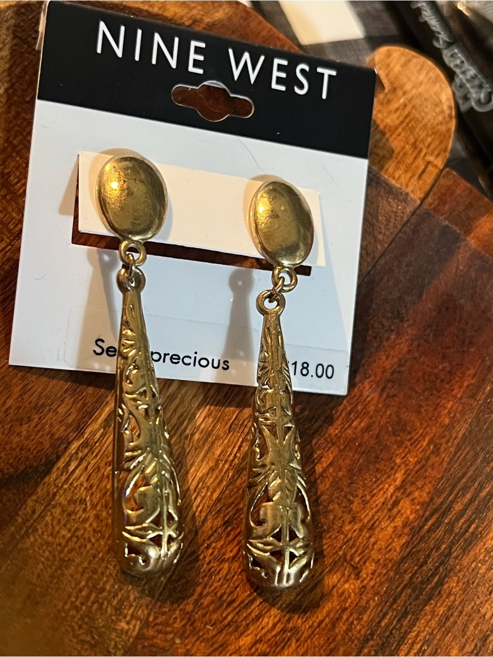 Earrings on Nine West card